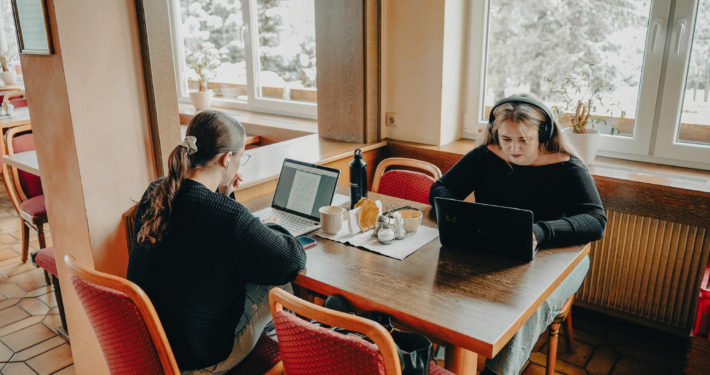 2 female students are learning in the dining room of the European Theological Seminary