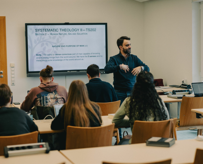 The President of the European Theological Seminary is teaching in the Classroom